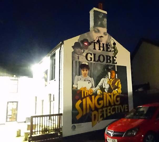 singing detective by dennis potter mural at night
